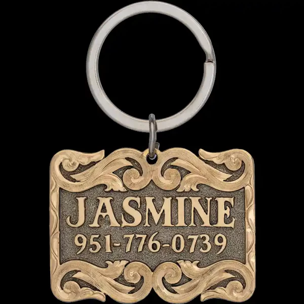 Introducing the Jasmine Custom Dog Tag! Crafted from a durable German Silver base  adorned with intricate jeweler's bronze letters and scrollwork. Order now!
